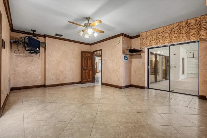 Virtually Staged. Master suite with slider to Enclosed patio