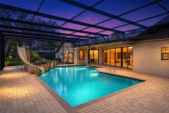 Sparkling Pool with slide, waterfall and screen.