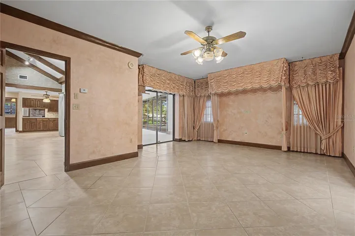 Virtually Staged. Master suite with slider to Enclosed patio