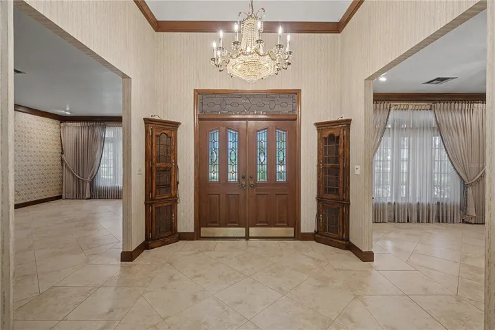 Grand Foyer with split formal Living & Dining
