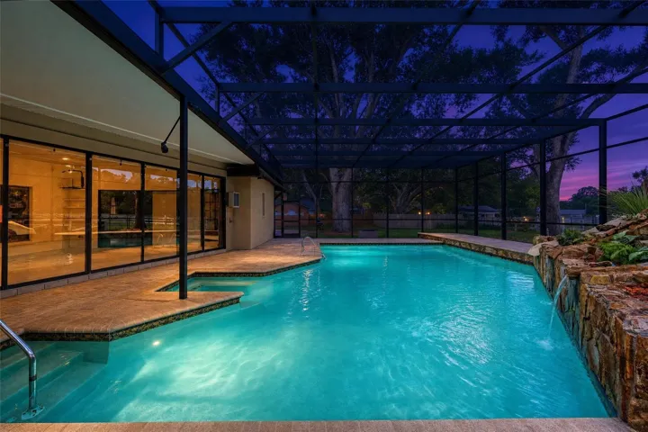 Sparkling Pool with slide, waterfall and screen.