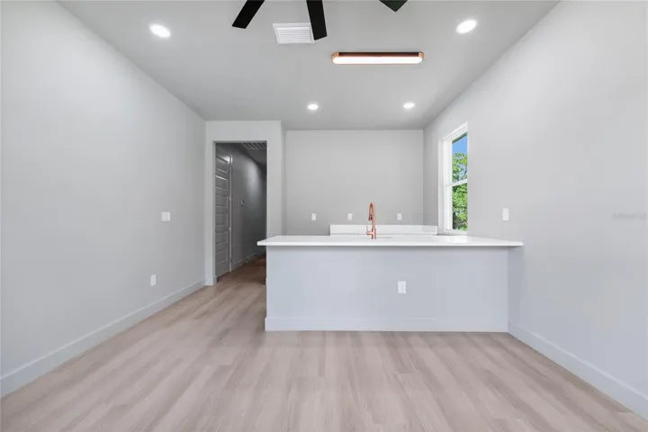 Den room with kitchenette
