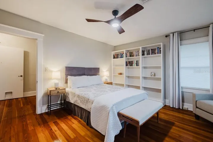 Bedroom 2 with built in shelving.