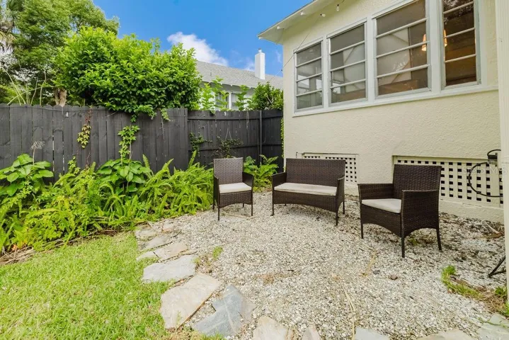 Shell seating area in private backyard.