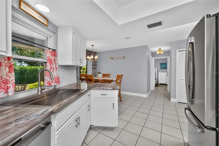 A convenient pass-through double-hung window to the lanai is a great feature!