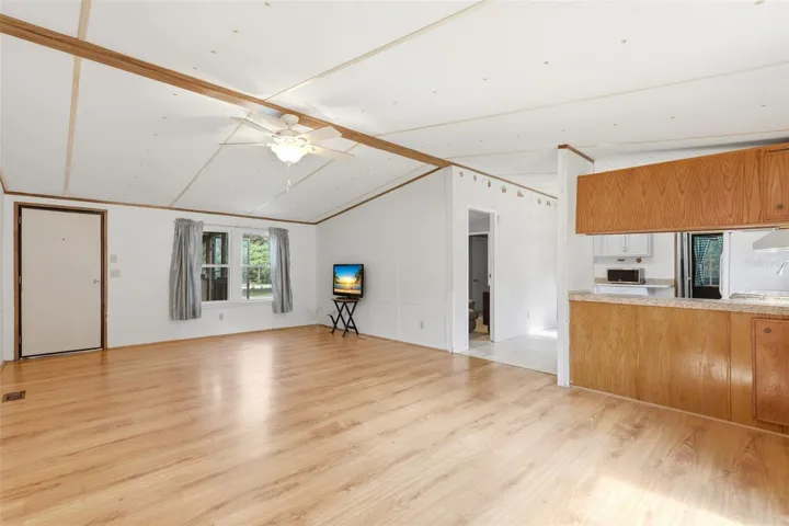 LIVING ROOM WITH DOOR TO FRONT PORCH