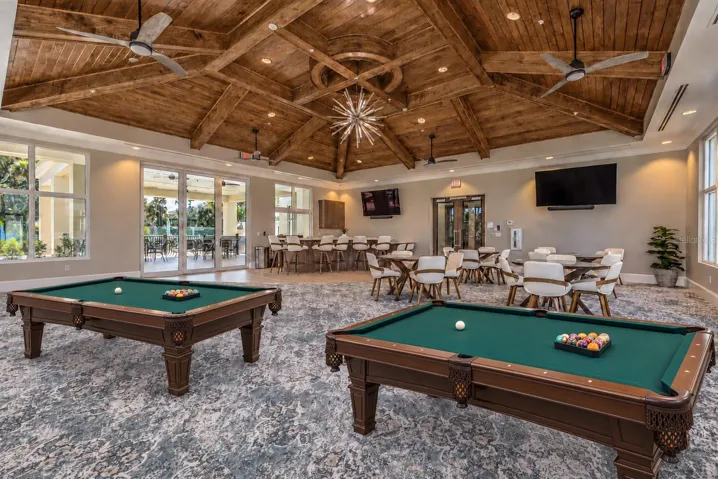 Pool tables virtually added to illustrate planned billiards area.
