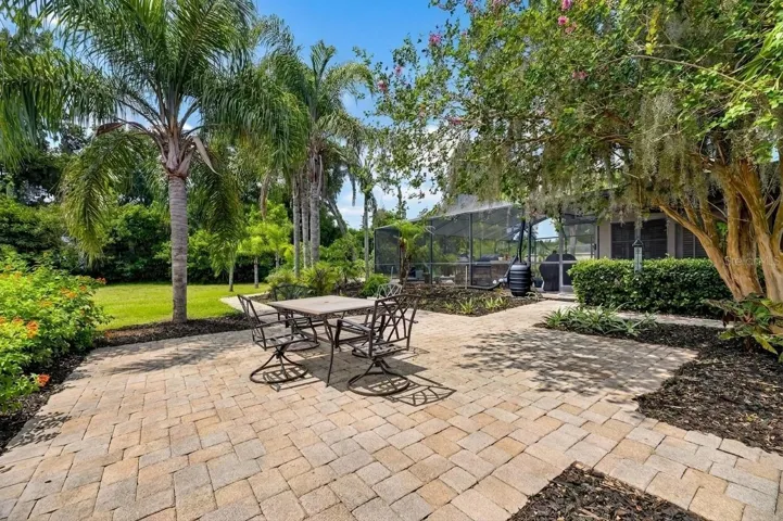 Additional patio adjacent to pool area.