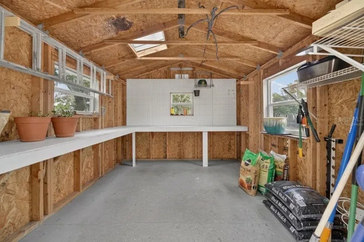 *Virtually Staged Empty* Interior of shed.