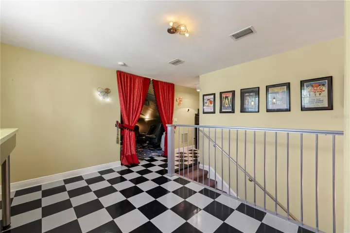 Behind the curtain awaits your private theater, while the retro-inspired lounge outside sets the stage for intermission drinks, conversation, and a little old-Hollywood charm.