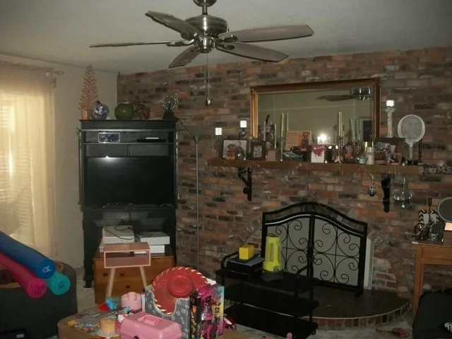 Family room with wood fireplace
