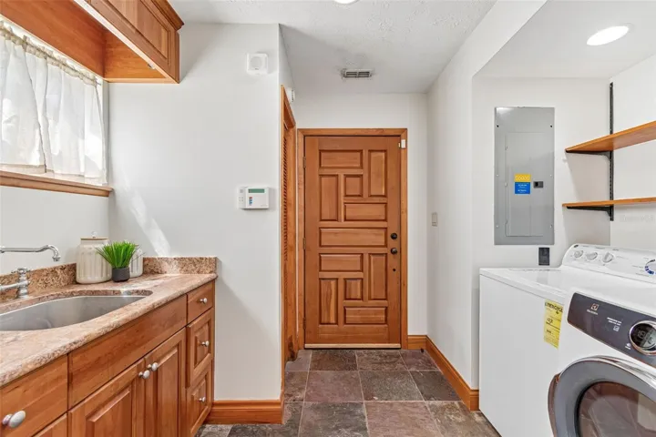 Laundry room has its own entrance from the outside