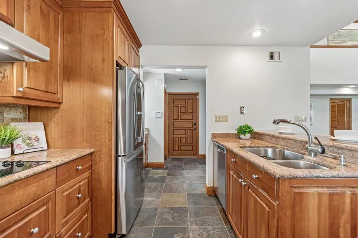 Kitchen with solid wood cabinets and granite counter tops