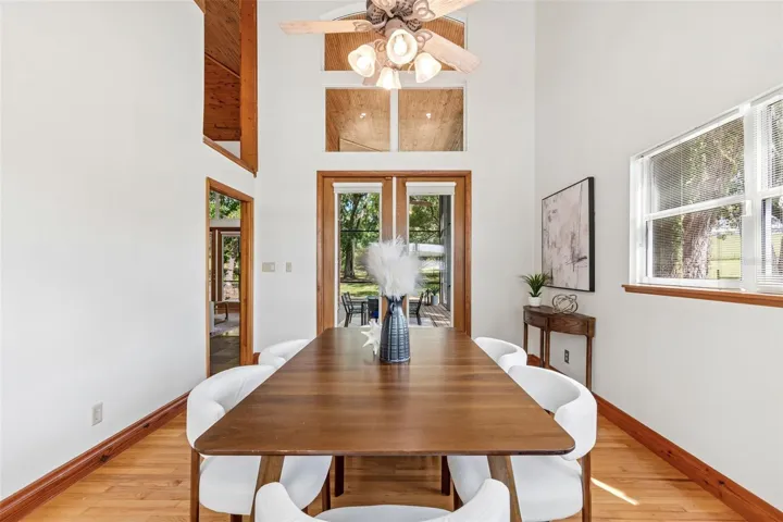 Massive dining room with a pass through window from the kithcen