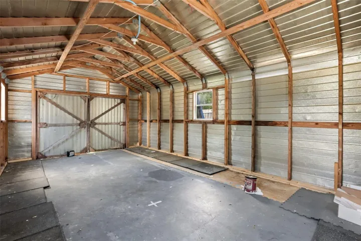 Huge onsite storage shed/workshop in back yard.
