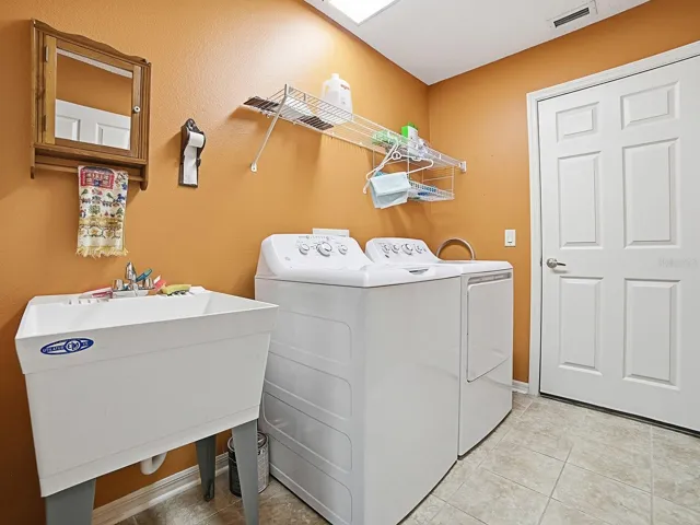 Inside laundry with sink