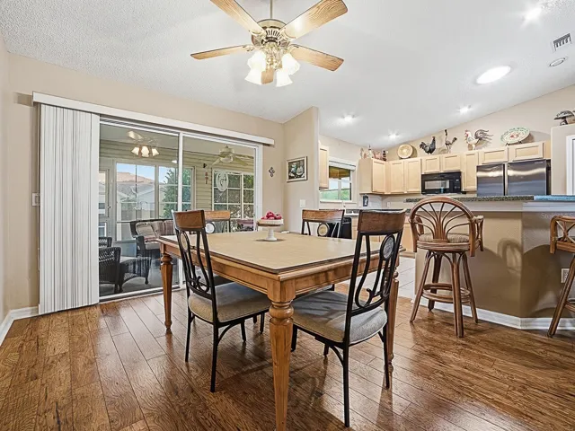 Dining room by slider and breakfast bar