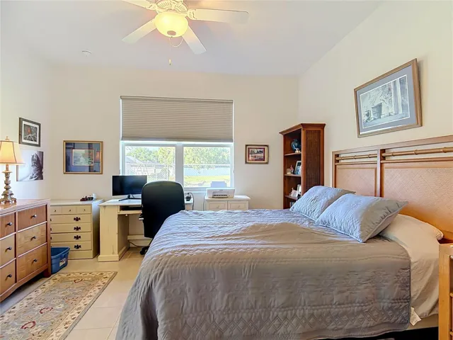 Primary Bedroom with View of Pond