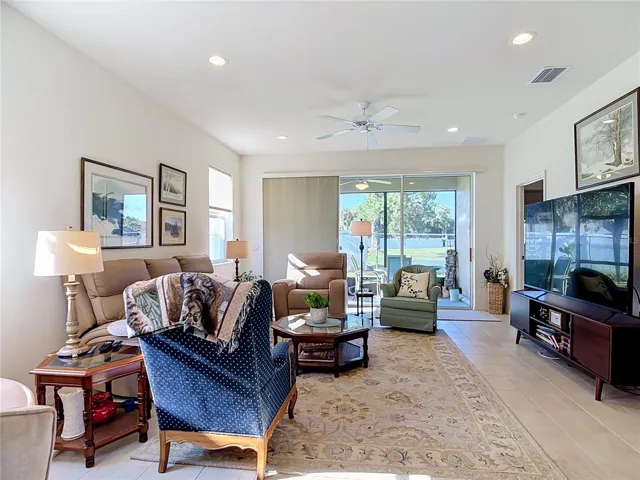 Living Room With 3 Way Sliding Door to Lanai