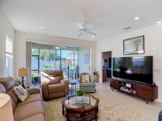 Living Room with View of Screened Lanai