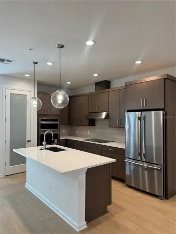 Gourmet kitchen with KitchenAid appliances