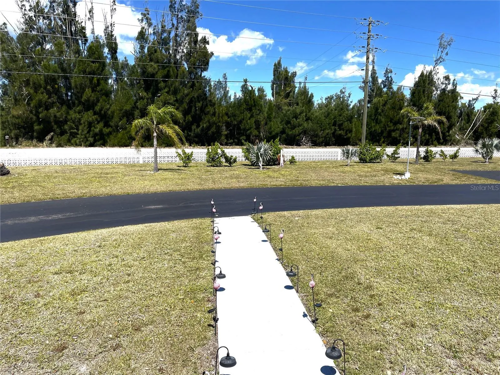 Near guest parking and mailboxes