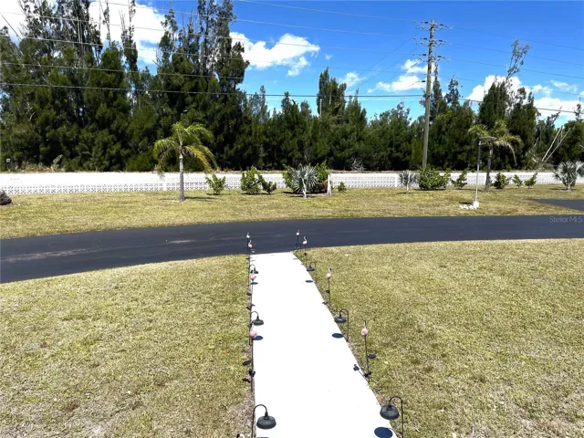 Near guest parking and mailboxes