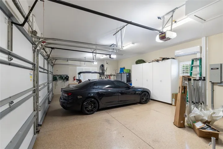 Epoxy 3 Car garage with a mini split a/c system
