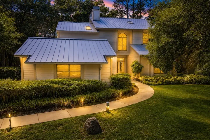 Coastal lake house with metal roof