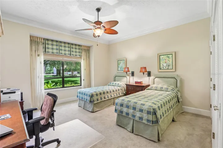 Bedroom 3 enjoys views of park-like front yard