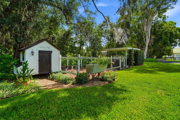 Carport chicken coupe and woodshed