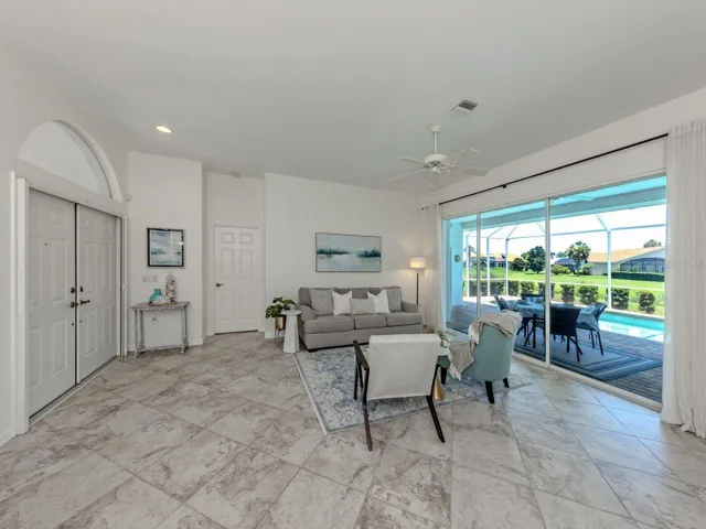 The formal living room is well adorned with stunning views!
