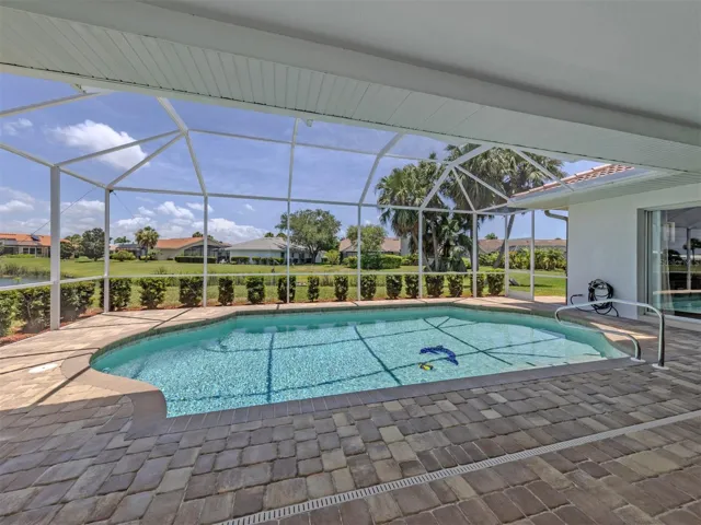 Plenty of extra space on this lanai for both a sitting area and dining space