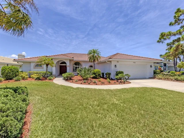 Perfectly situated on a beautiful lot with water view