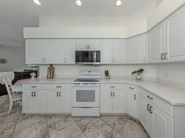 Lots of storage and extra counter space in this kitchen makes serving a breeze