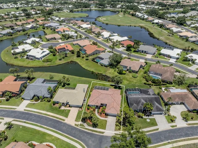 This home is so well maintained and features beautiful flowerbeds and foilage