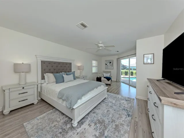 The primary suite is located on once side of the home and includes sliding glass door access to the lanai, large walk in closet, linen closet, storage closet and private ensuite making this an owners paradise!