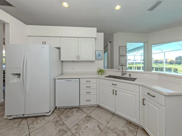 The chef will love to looking out of the spacious lanai and sparkling pool!