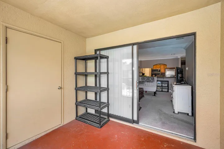 Storage closet to left, looking into living room.