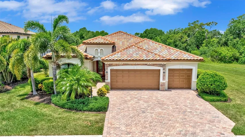 4/2  3 car garage/ Pool /Lake views