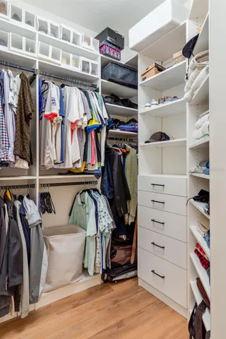 Primary bedroom closet 1