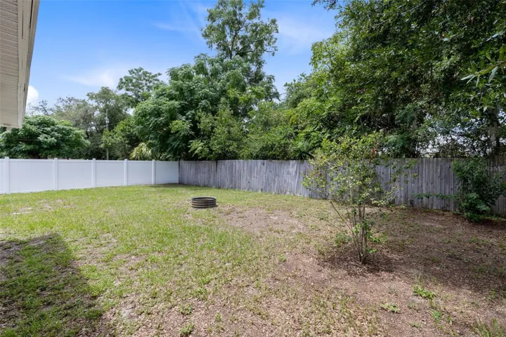 Oversized fenced in backyard is perfect for the pets or kicking a ball aaround
