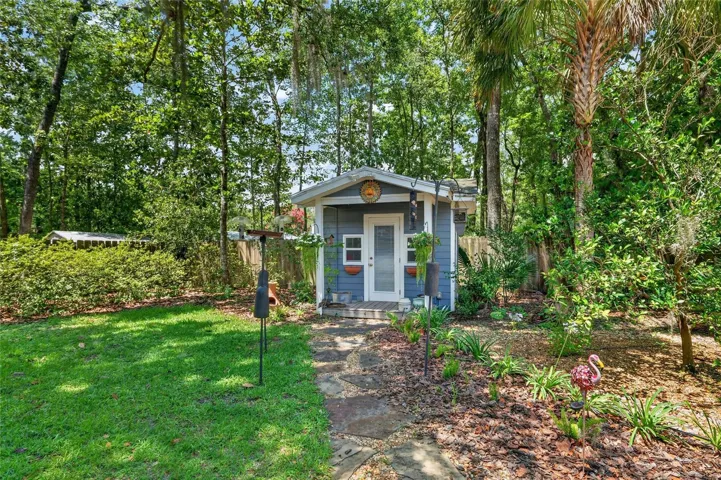 CHARMING PLAYHOUSE MATCHES THE HOUSE
