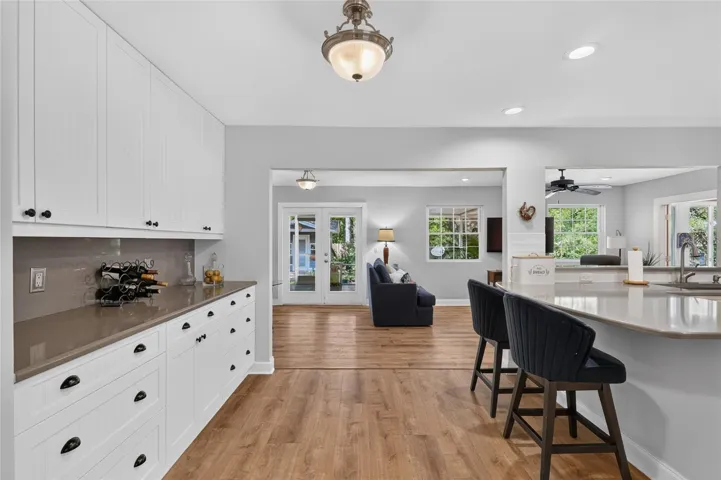 ENTERING EAT-IN AREA IN KITCHEN FROM FOYER