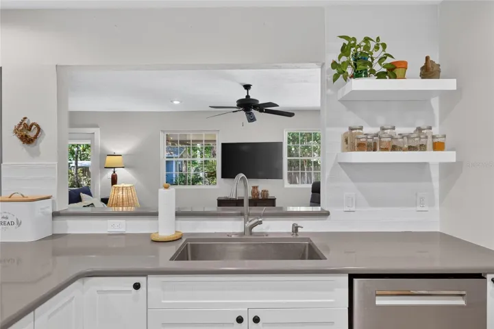 SINK AREA OVERLOOKS FAMILY ROOM