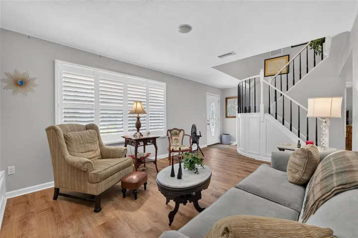 LIVING ROOM - LVP FLOORING THROUGH DOWNSTAIRS