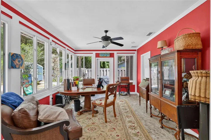 GLASS WINDOWS LINE THE FLORIDA ROOM
