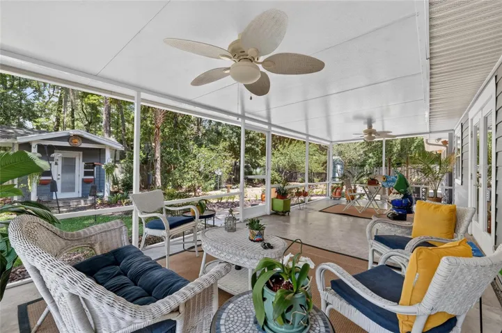 PLENTY OF SEATING AREA ON SCREEN PORCH