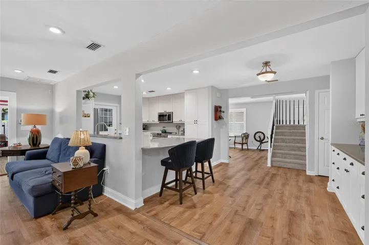 LOOKING BACK FROM FAMILY ROOM TO FRONT OF HOUSE