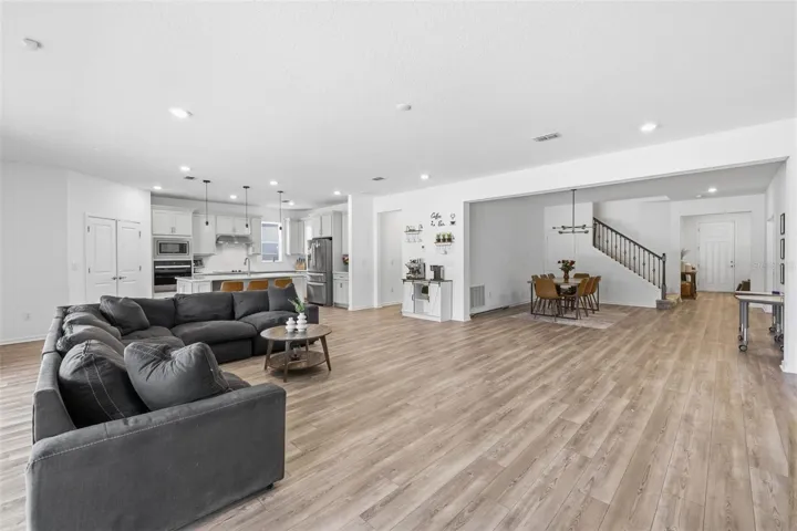 open concept living and dining areas